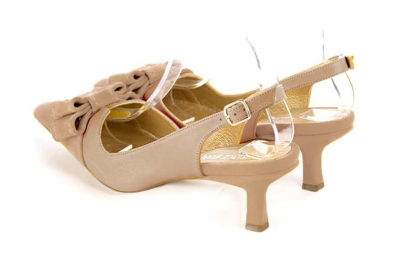 Tan beige women's open back shoes, with a knot. Tapered toe. Medium spool heels. Rear view - Florence KOOIJMAN
